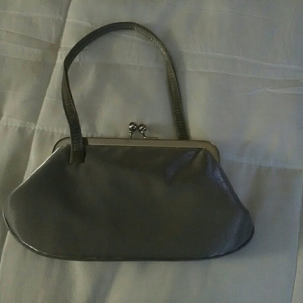 Carol Fellini Silver Wristlet